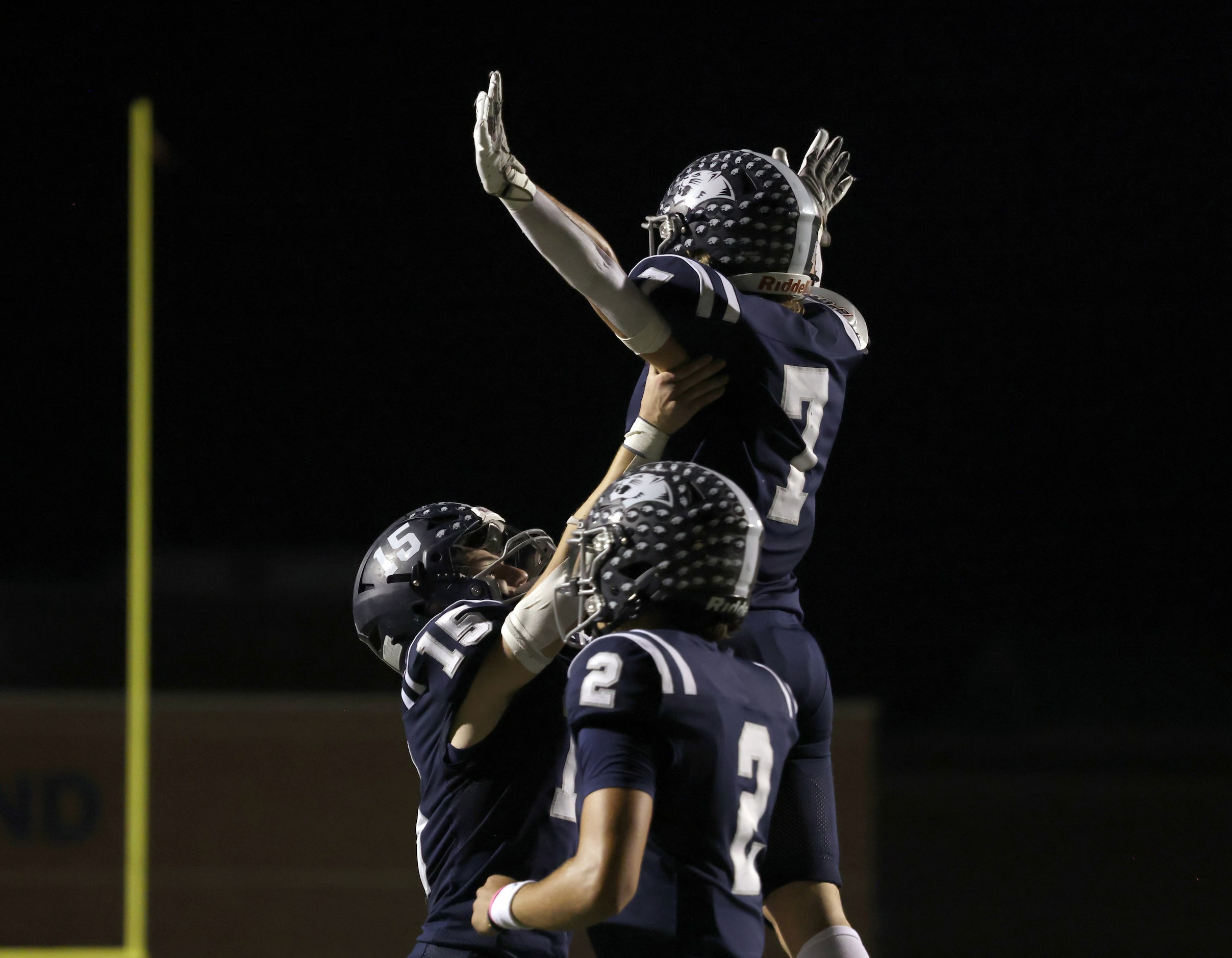 Flower Mound receiver Ryan Stadler (7), top, celebrates his receiving touchdown with...