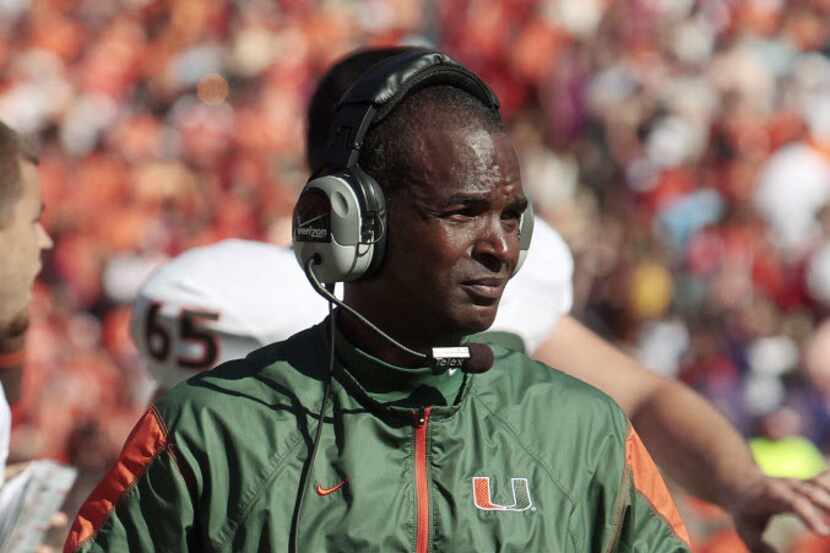 In this Oct. 2, 2010, file photo, Miami coach Randy Shannon watches his team against Clemson...