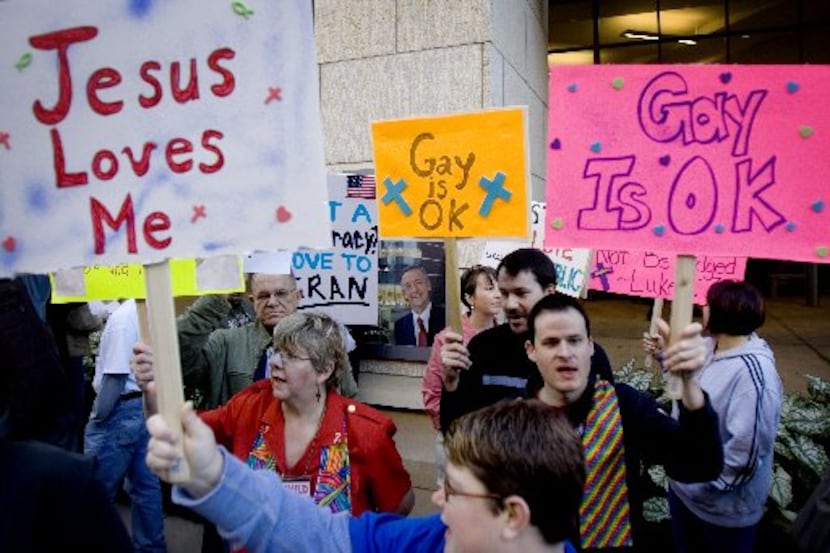 Protesters sang "Jesus Loves Me" outside of First Baptist Church of Dallas on Nov. 9, 2008. 