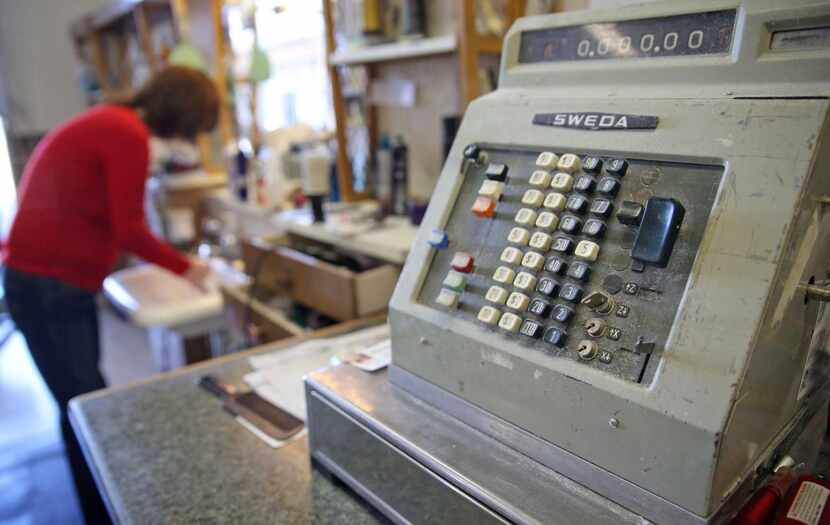 
Melanie Rider, owner and barber at the Lakeland Barber Shop, keep a vintage, working...