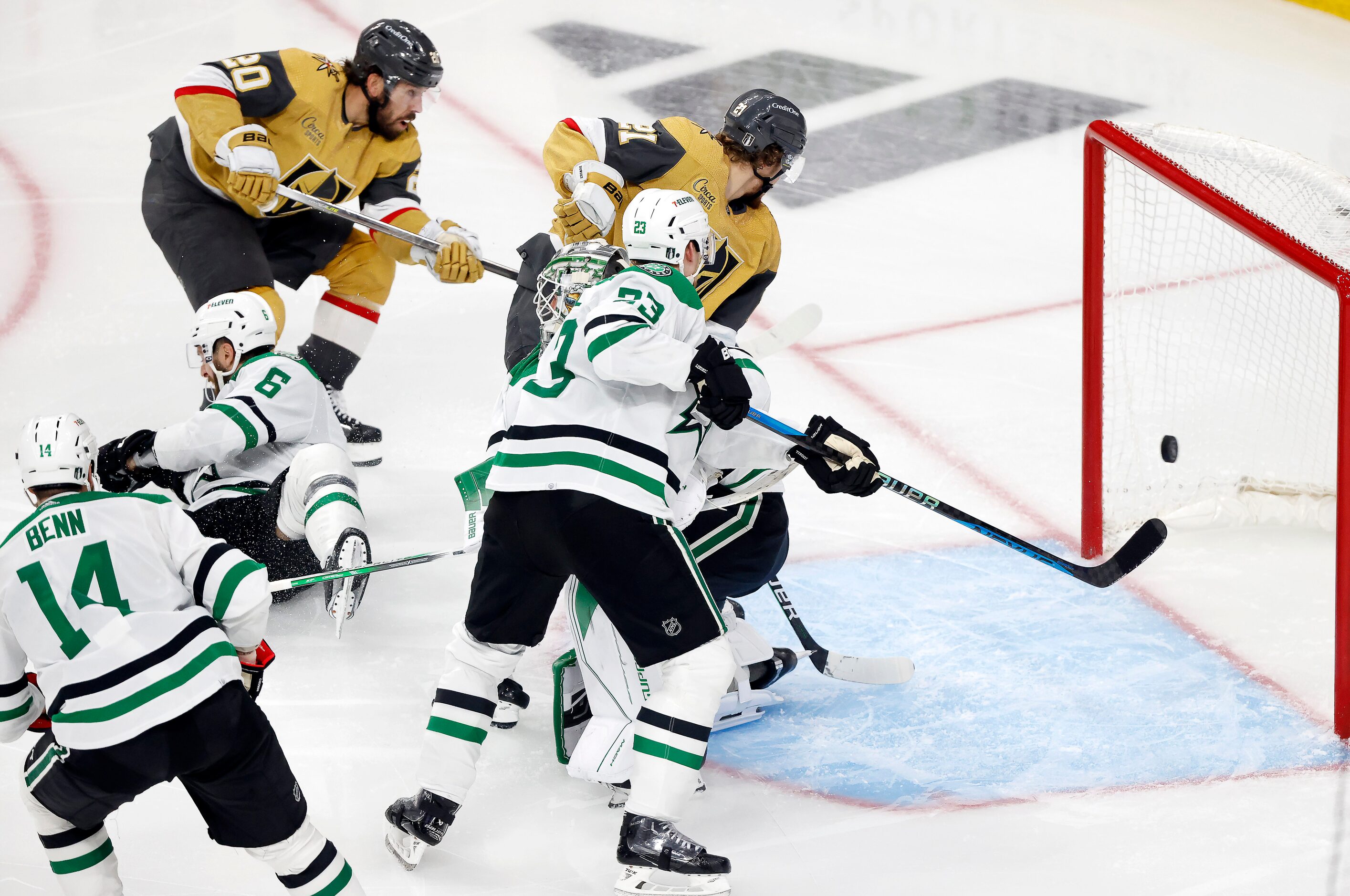 Vegas Golden Knights center Chandler Stephenson (20) scores on Dallas Stars goaltender Jake...