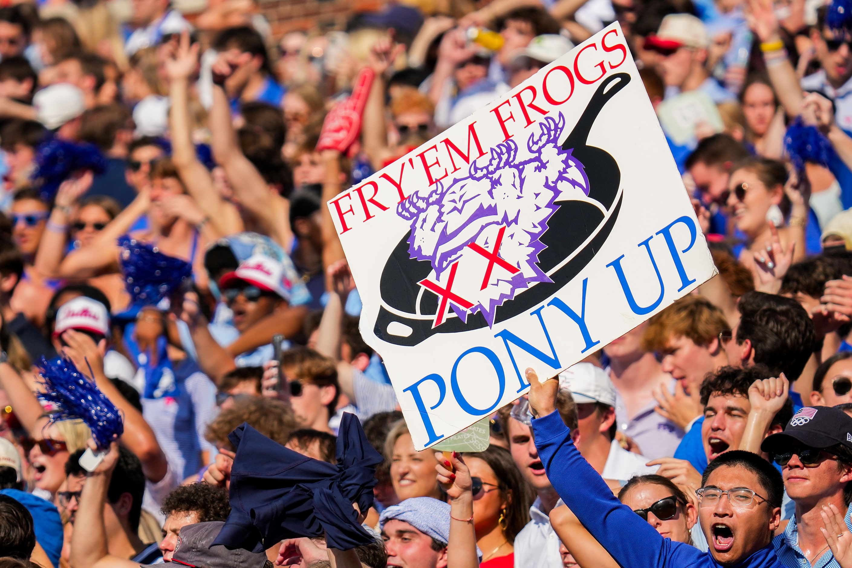 SMU fans cheer a score during the first half of an NCAA football game TCU at Ford Stadium on...