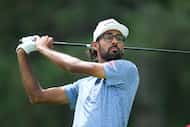 Akshay Bhatia hits off the fourth tee during the first round of the Rocket Mortgage Classic...