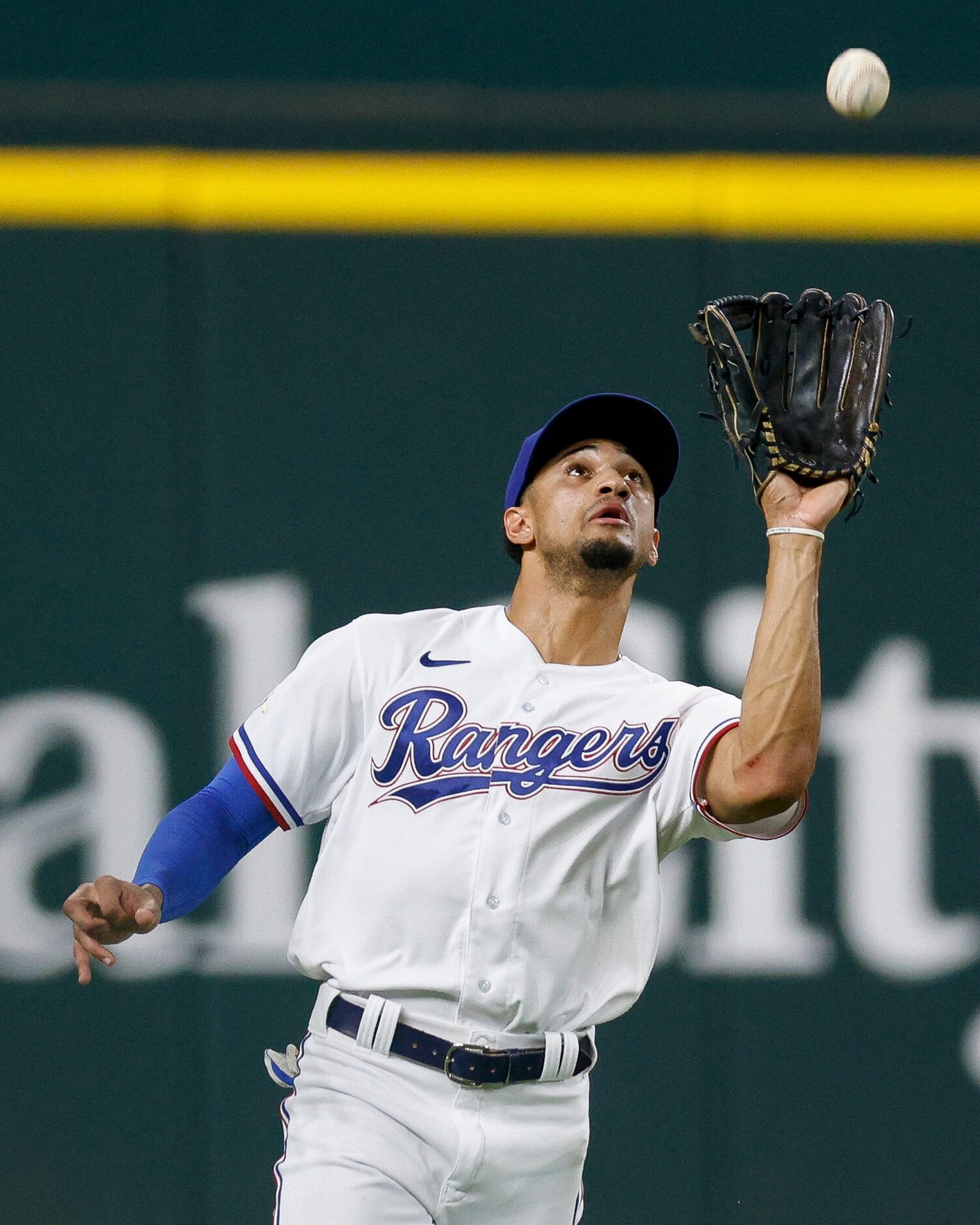 Texas Rangers left fielder Bubba Thompson (65) catches a ball from Oakland Athletics...