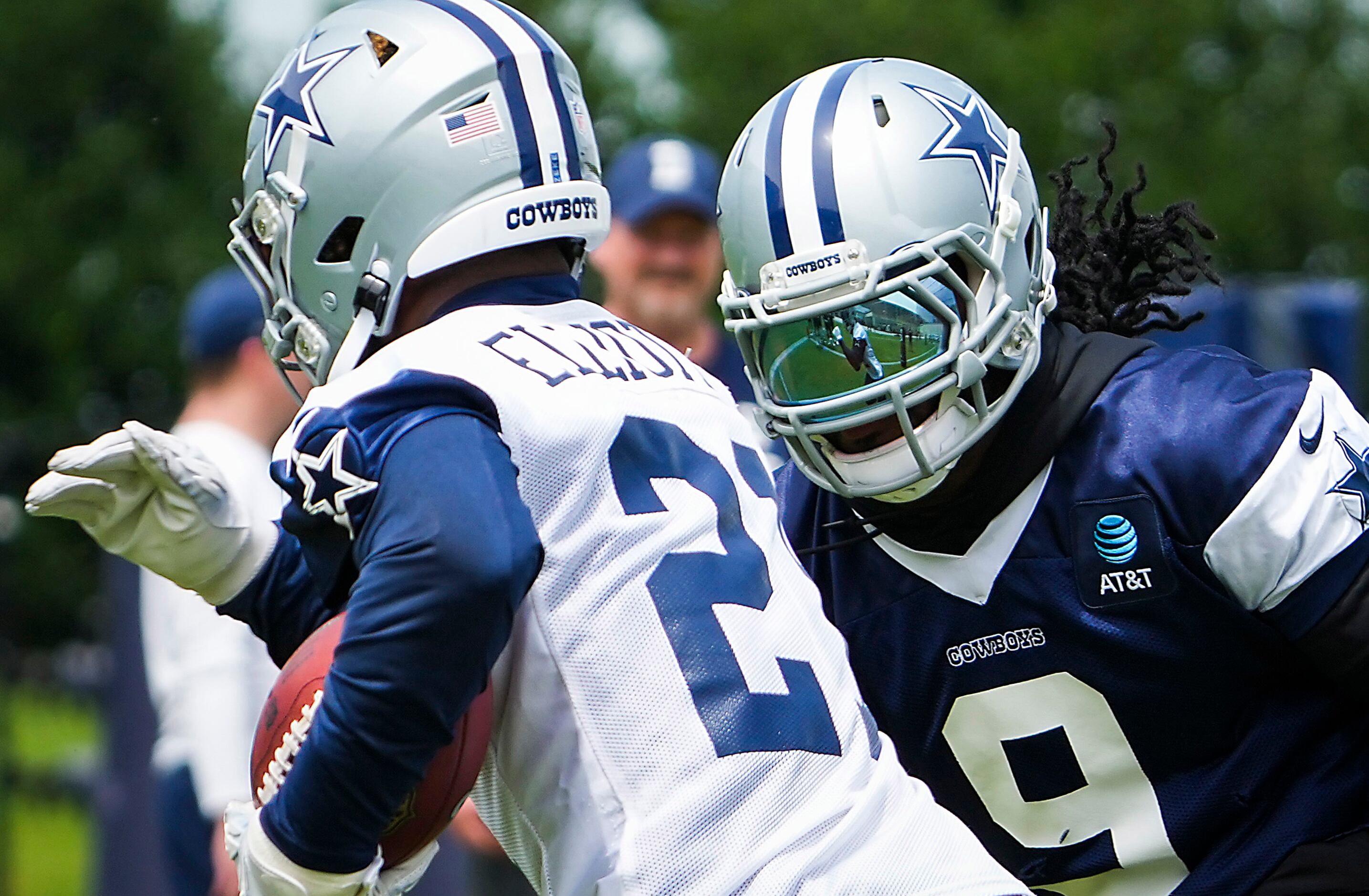 Dallas Cowboys linebacker Jaylon Smith (9) chases running back Ezekiel Elliott (21) during a...