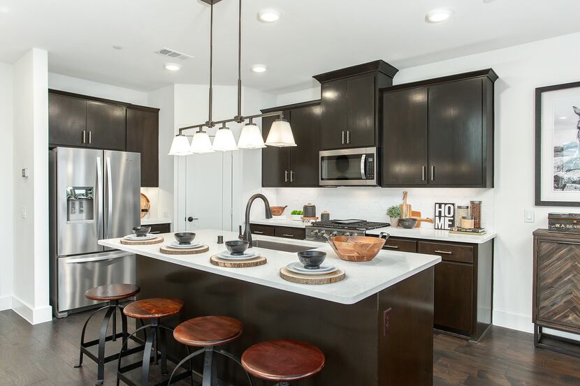 Grenadier Homes offers pre-grand opening specials on low-maintenance townhomes at the new...