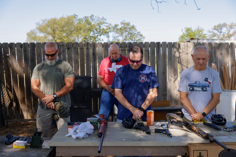 Michael Walker of CrossRidge Church (front left), Kevin Livesey (front center) and Charlie...