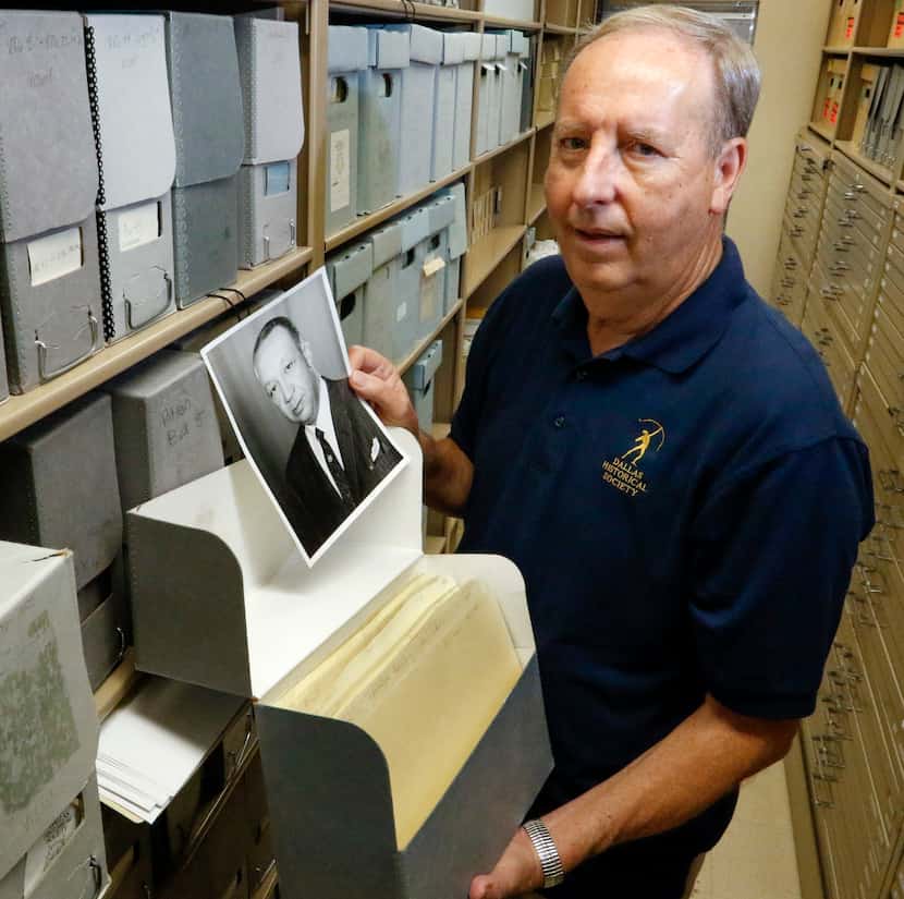 Retiree Leonard Davis, 70, volunteers in the Dallas Historical Society photo archives at...
