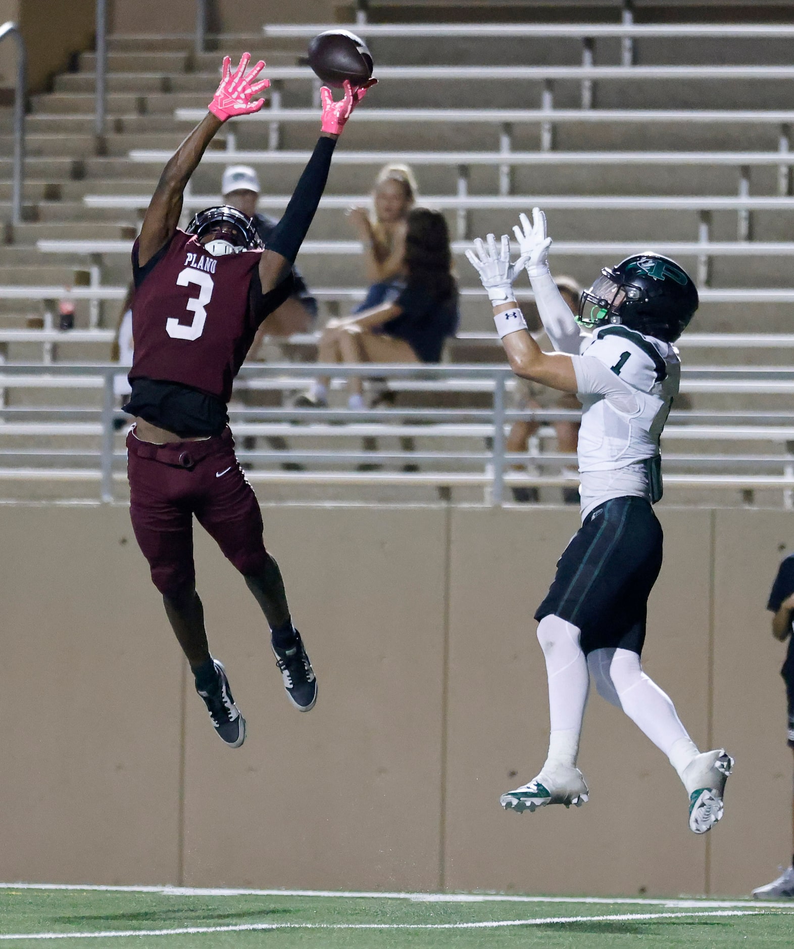 Plano High defensive back DJ Hamilton (3) goes high to tip a would-be touchdown pass to...