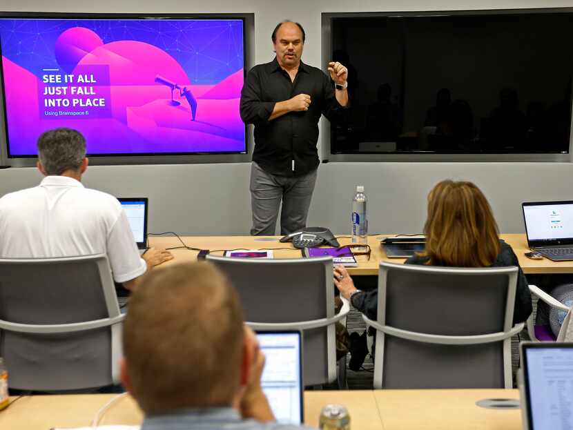 Dave Copps, CEO and founder of Brainspace, a Cyxtera business, speaks during a training...