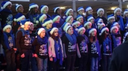  Members of the Hicks Elementary choir in Frisco kick off the pre-Santa performances at...