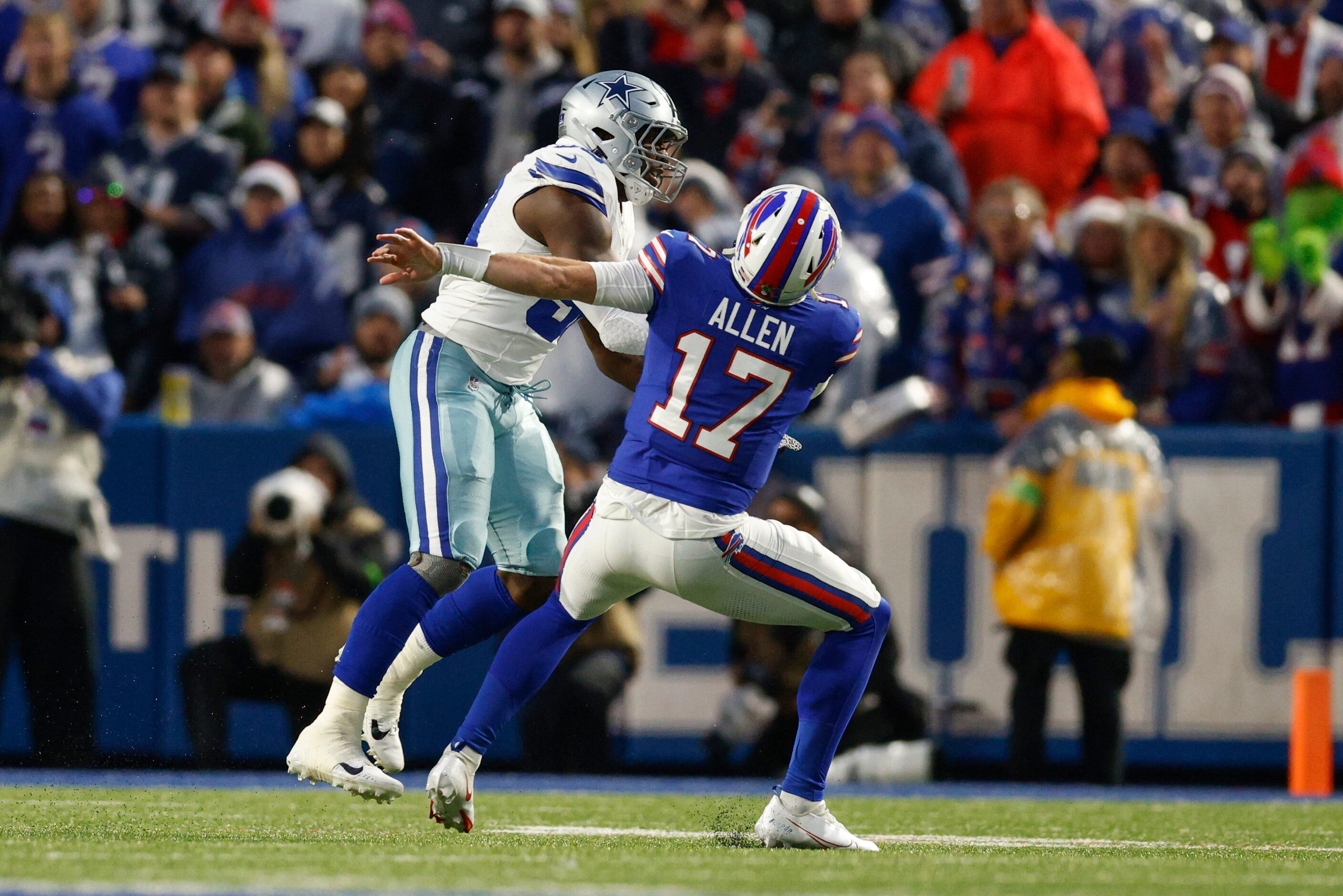 Dallas Cowboys defensive end Dorance Armstrong (92) hits Buffalo Bills quarterback Josh...