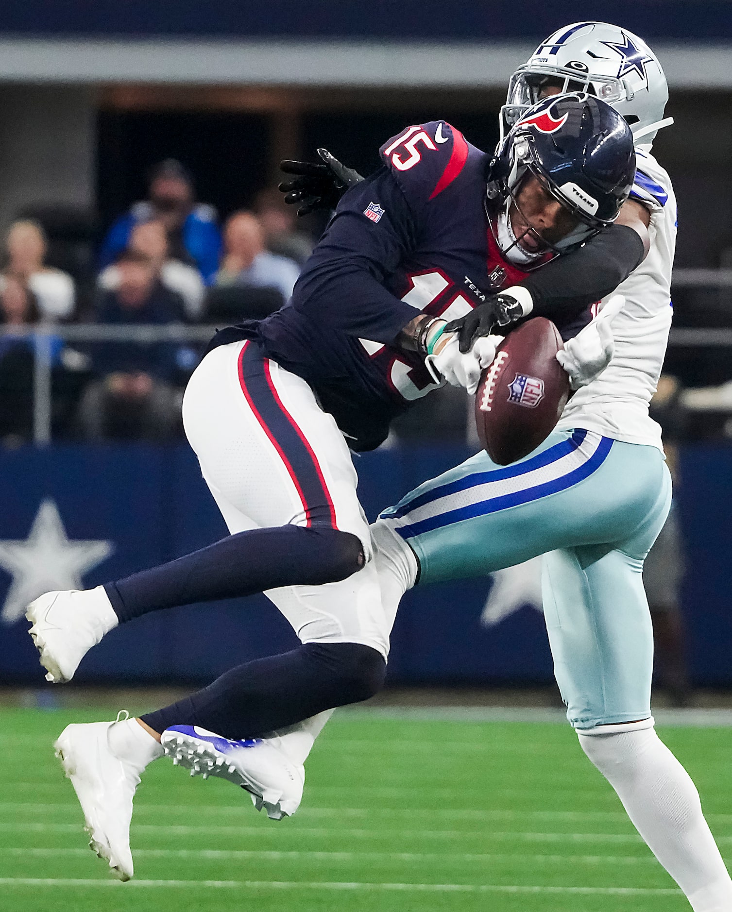 Dallas Cowboys cornerback Kelvin Joseph (1) breaks up a pass intended for Houston Texans...