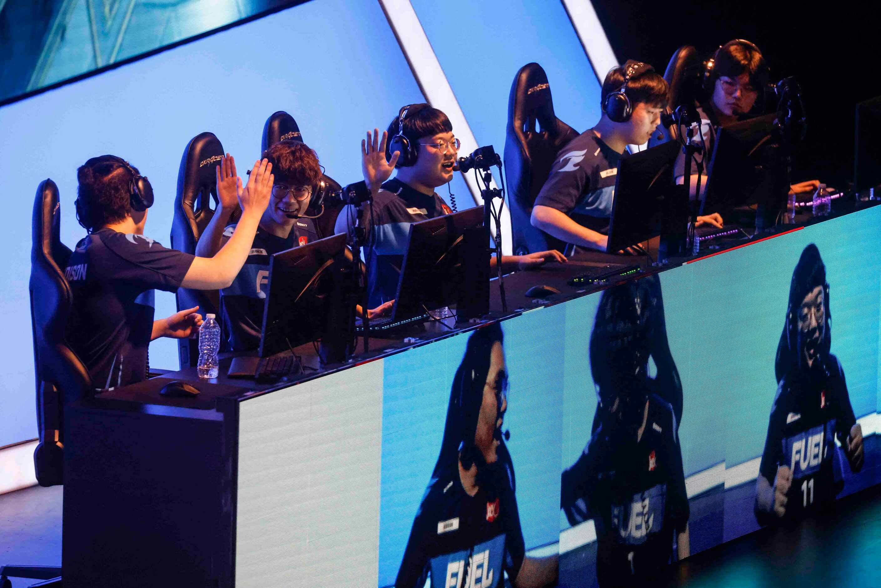 Dallas Fuel players celebrate after winning the second map against Toronto Defiant during...