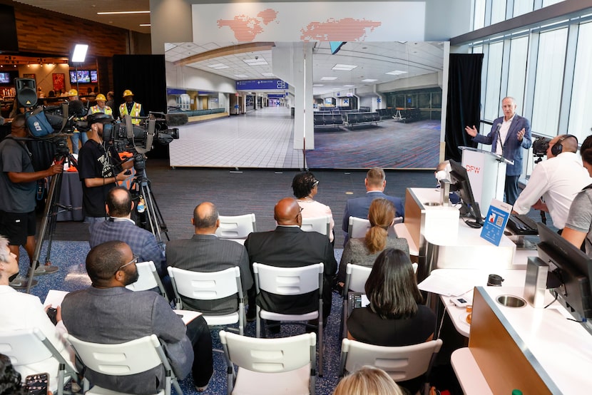 DFW International Airport CEO Sean Donohue speaks during a wall-breaking ceremony for the...