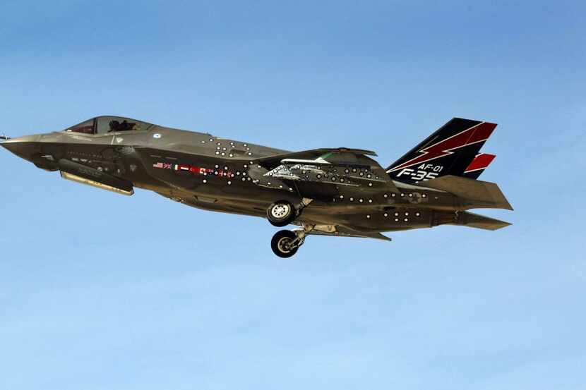 The Lockheed Martin F-35 Lightning II lifts off during testing at California's Edwards Air...