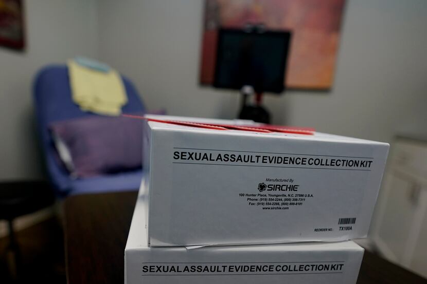 A Sexual Assault Evidence Collection Kit, or Rape Kit, rests on a table in an examination...