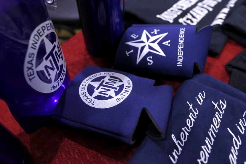 Items for sale by the Texas Nationalist Movement lay on a table before a recruiting meeting...