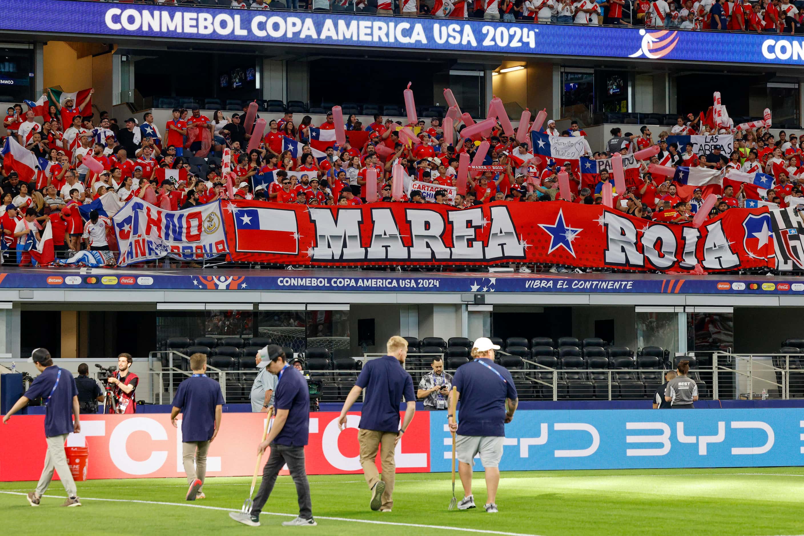 Chile fans raise several large banners before a Copa America Group A soccer match against...