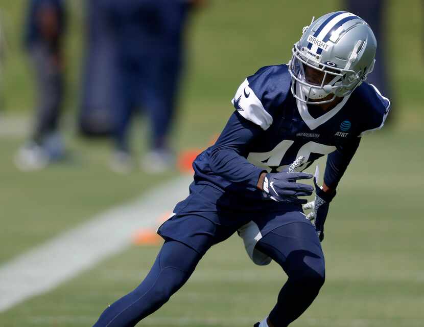 Dallas Cowboys rookie cornerback Nahshon Wright (40) runs through a drill during rookie...