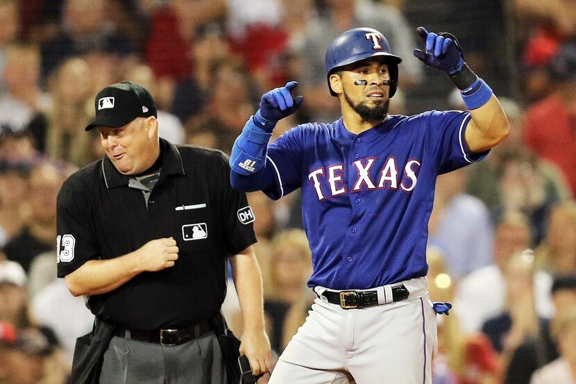 BOSTON, MA - JULY 9:  Robinson Chirinos #61 of the Texas Rangers reacts after hitting a...