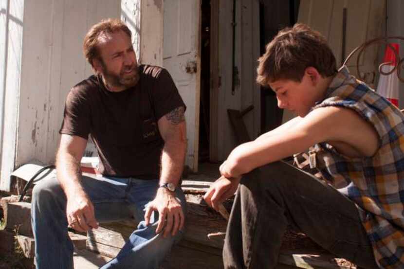 
Nicolas Cage, pictured with Tye Sheridan, says the character’s darkness drew him to the...