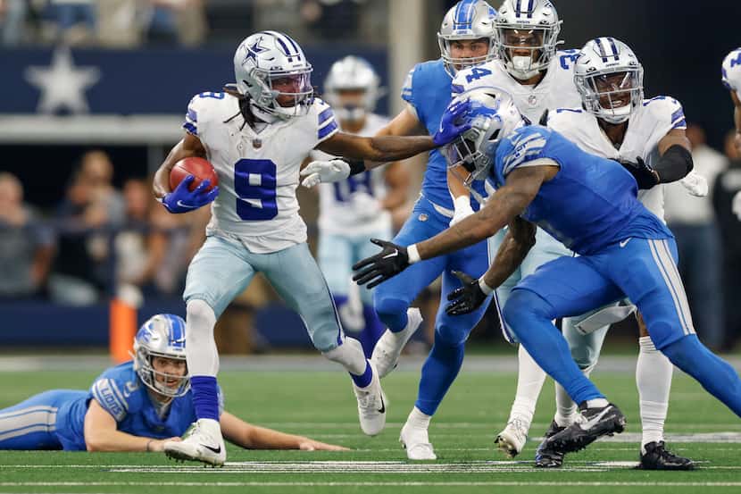 Dallas Cowboys wide receiver KaVontae Turpin (9) stiff-arms Detroit Lions safety DeShon...
