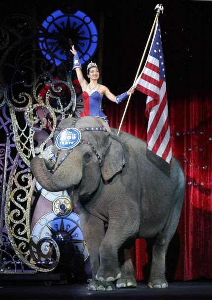 An Asian elephant performed during the national anthem at the animals' final Ringling Bros....