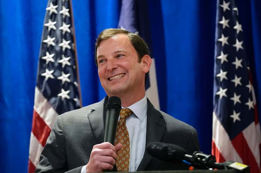 Texas Republican congressional candidate Craig Goldman smiles while speaking at an election...