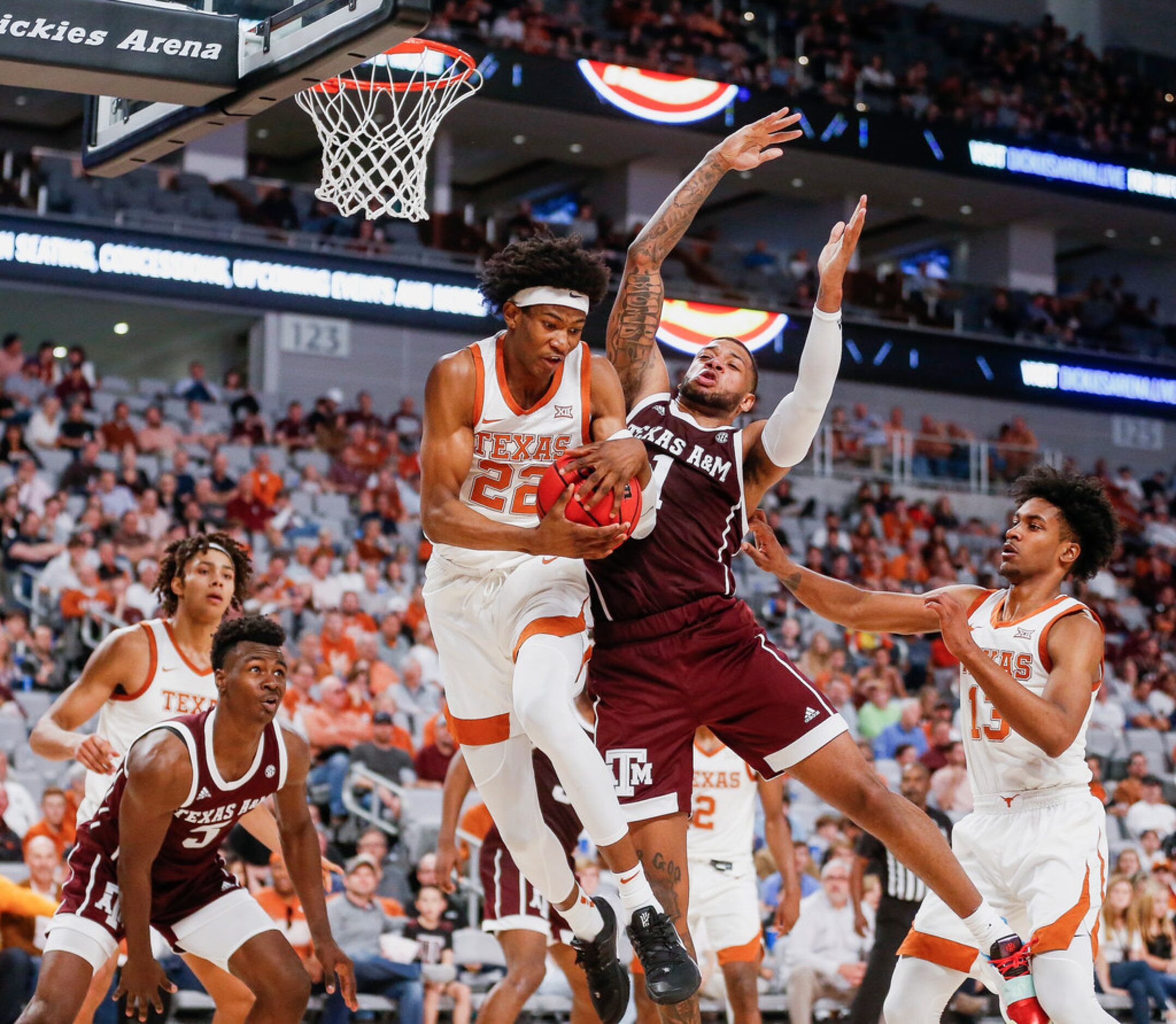 Texas Longhorns forward Kai Jones (22) pulls down a rebound past Texas A&M Aggies guard...