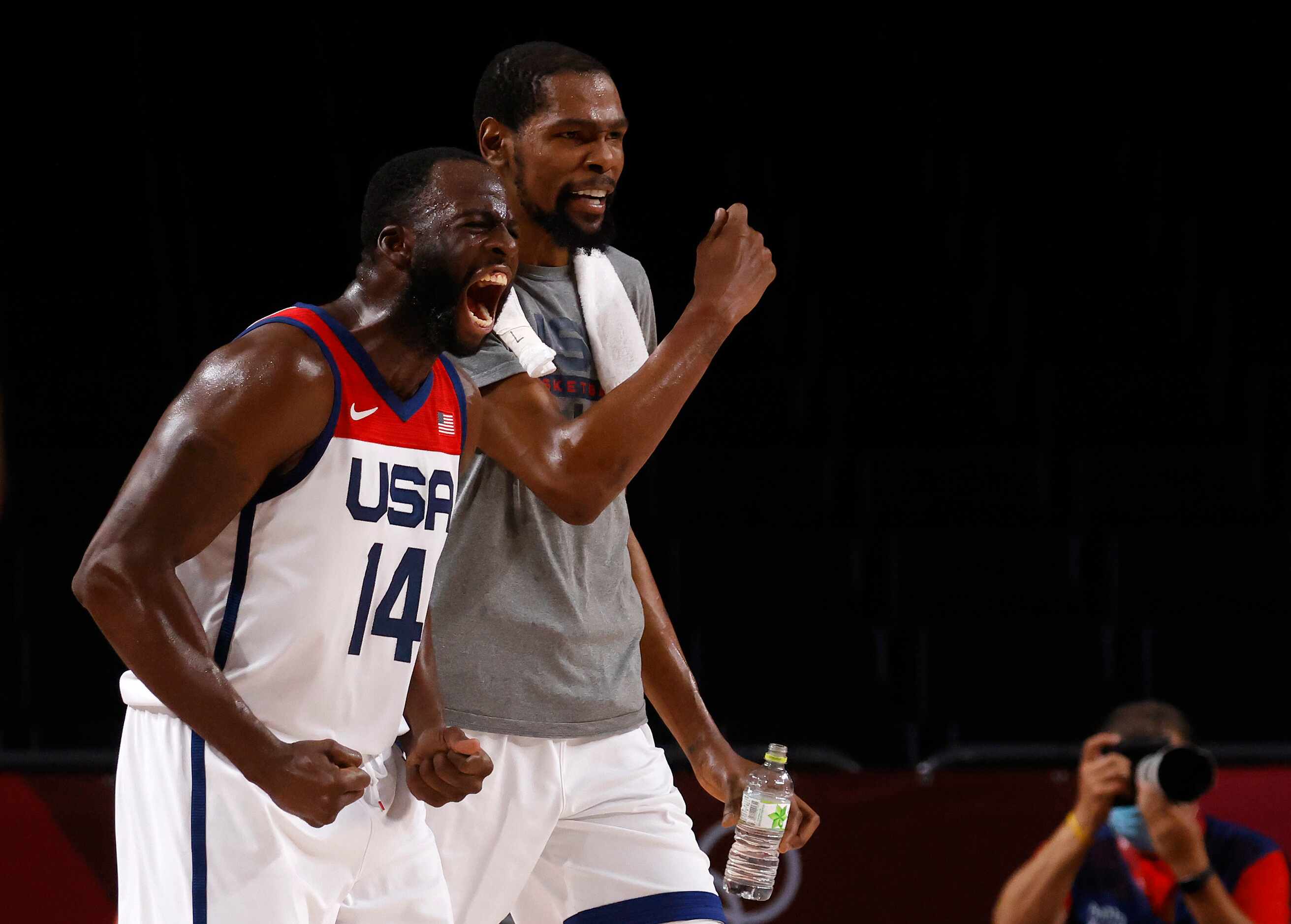 USA’s Draymond Green (14) and Kevin Durant (7) celebrate a made basket in a game against...