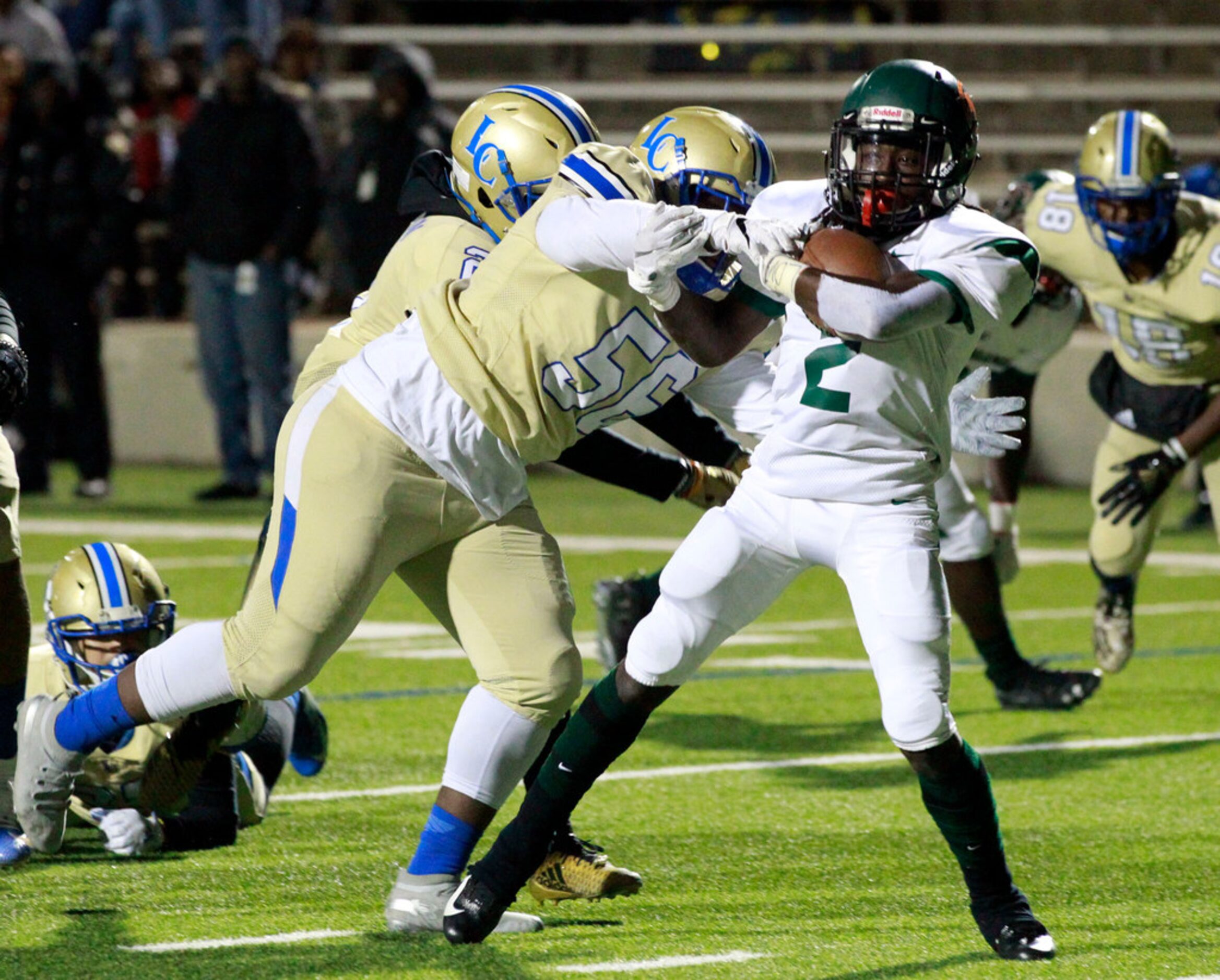 Naaman Forest Sir Coleman (2) scores a touchdown, as Lakeview defender Abdulhadi Darkazalli...