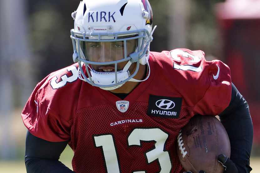 Arizona Cardinals' second-round draft pick Christian Kirk (13) runs drills during football...