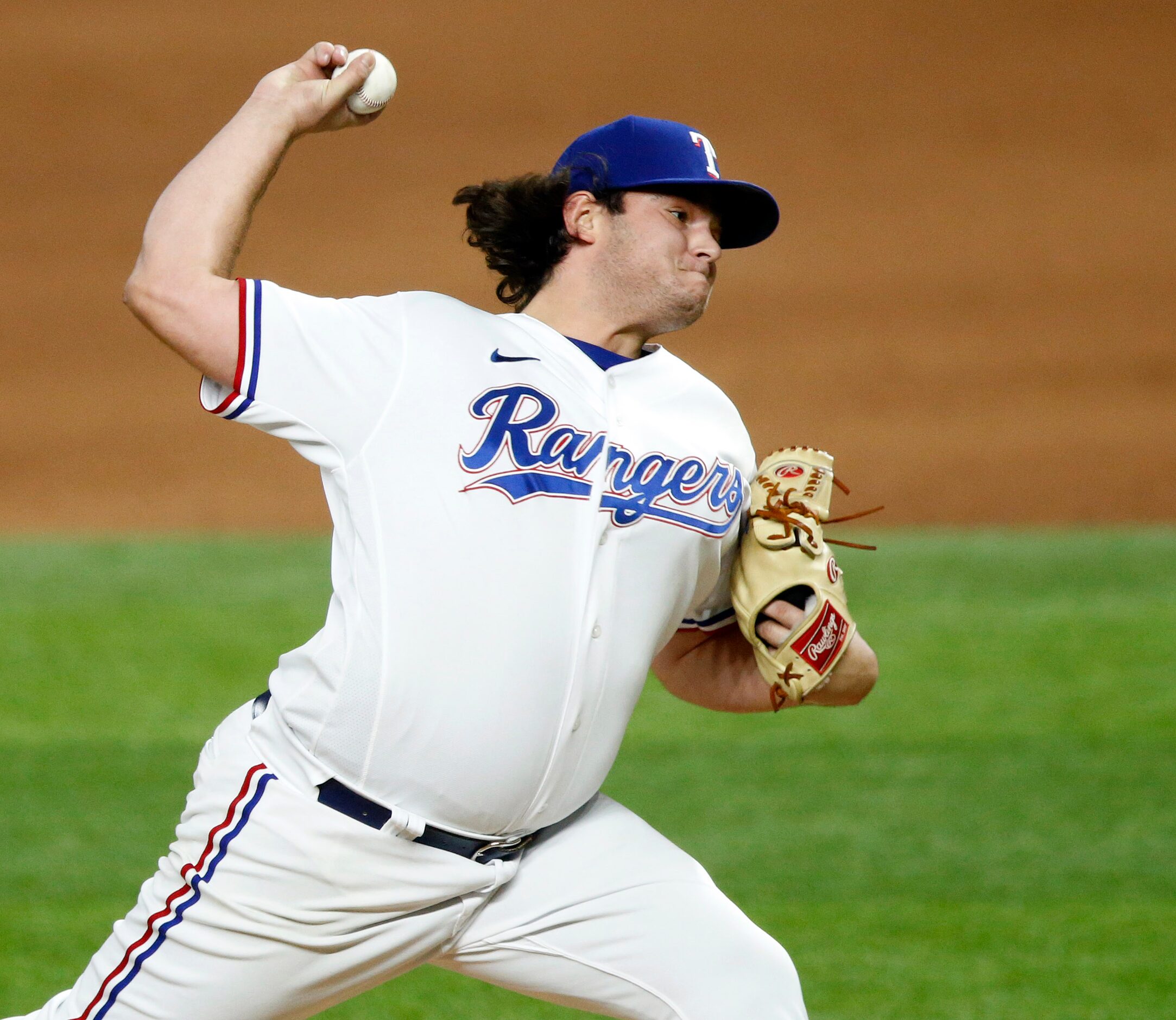 Texas Rangers relief pitcher Ian Gibaut (63) throws against the Arizona Diamondbacks during...