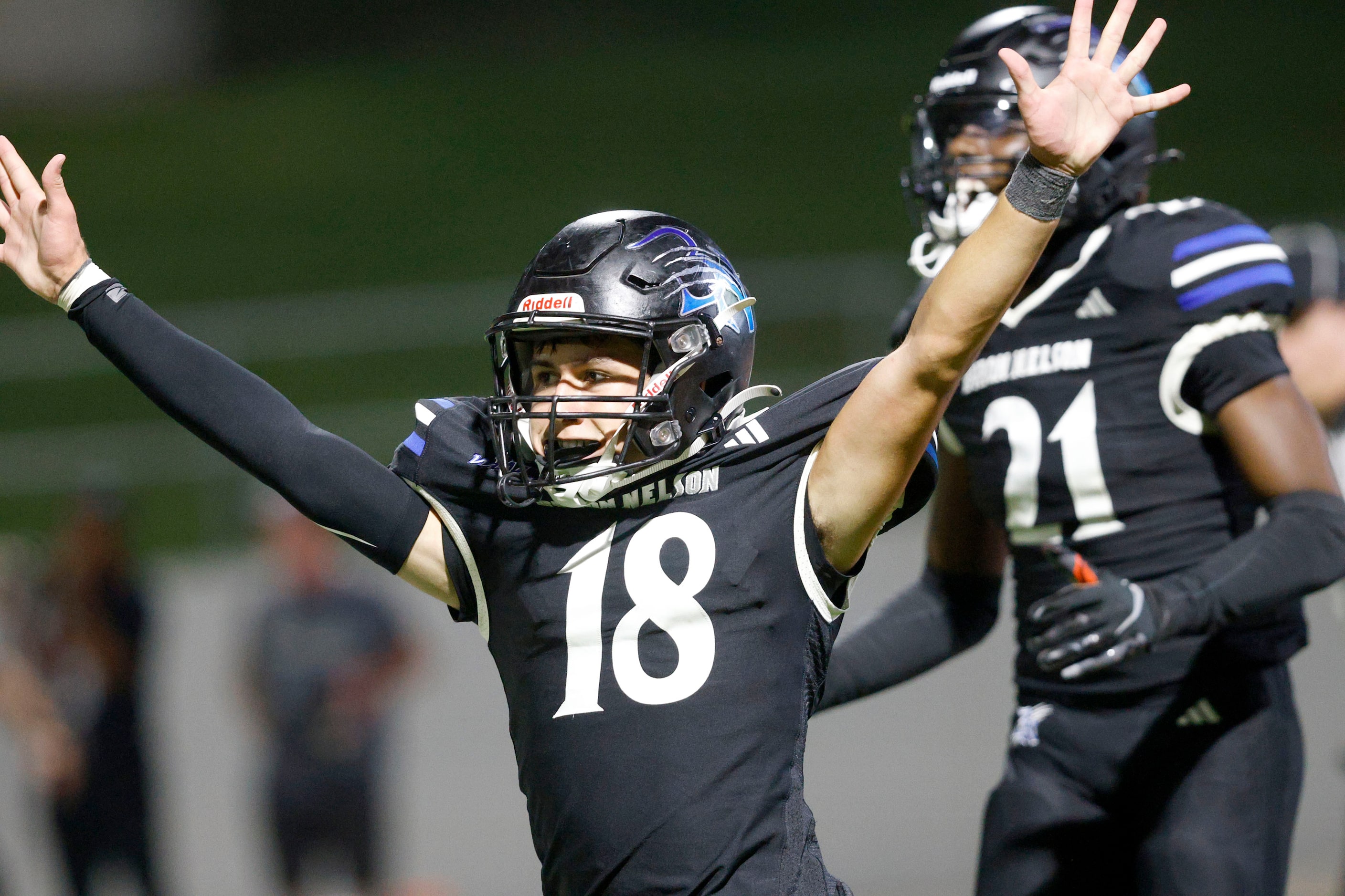 Byron Nelson's Logan Cortez (18) reacts after blocking a pass against Lewisville at the end...