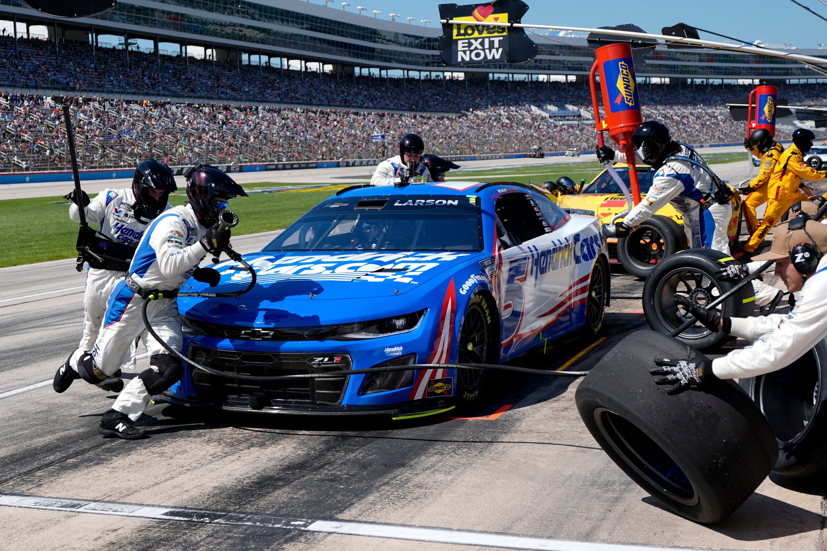 Kyle Larson (5) pits during a NASCAR Cup Series auto race at Texas Motor Speedway in Fort...