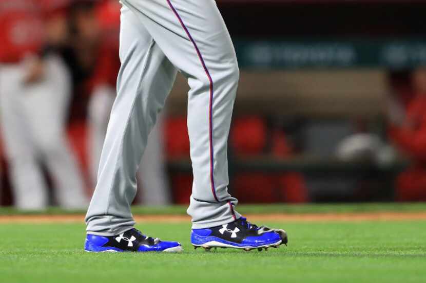 ANAHEIM, CA - APRIL 11:  Sam Dyson #47 of the Texas Rangers walks back to the mound after...