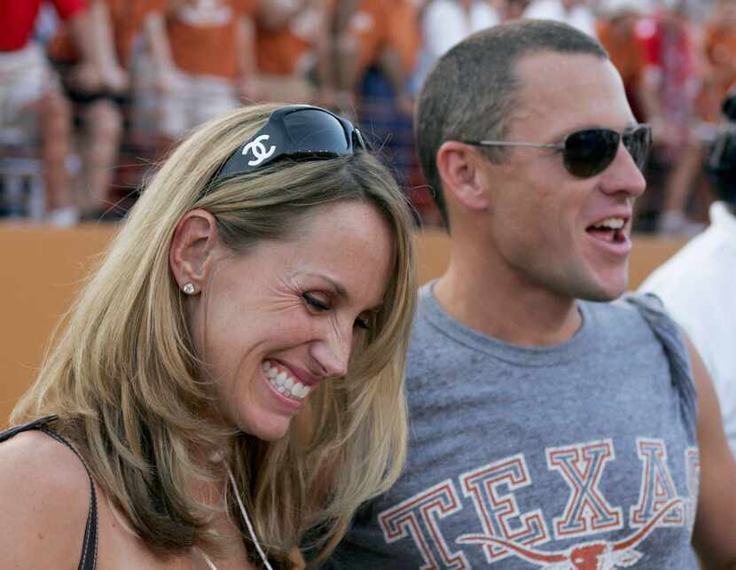 Lance Armstrong, right, stands on the sidelines with his former wife Kristin before the Ohio...