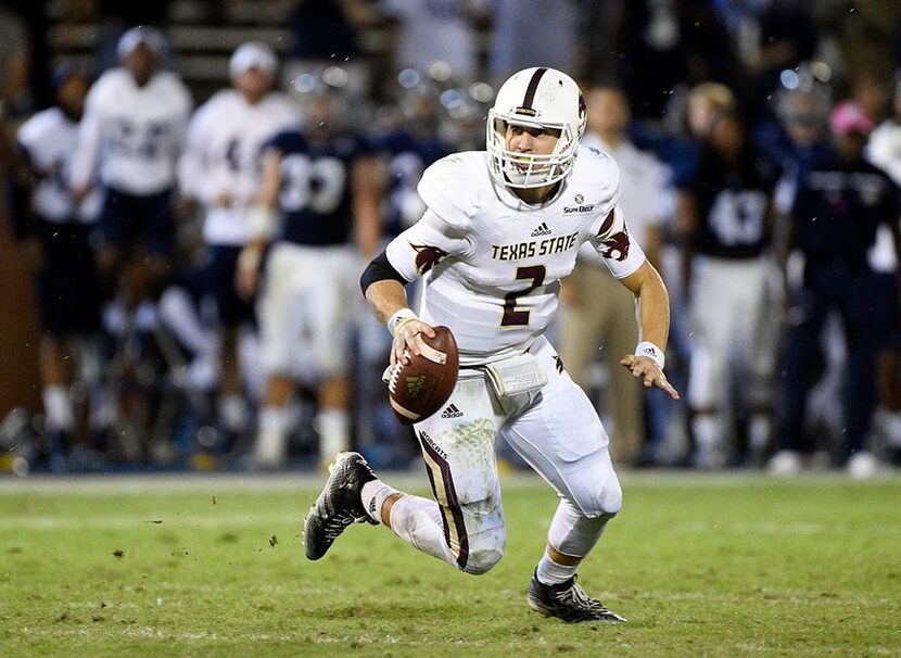 STATESBORO, GA - OCTOBER 29: Quarterback Tyler Jones #2 of the Texas State Bobcats scrambles...