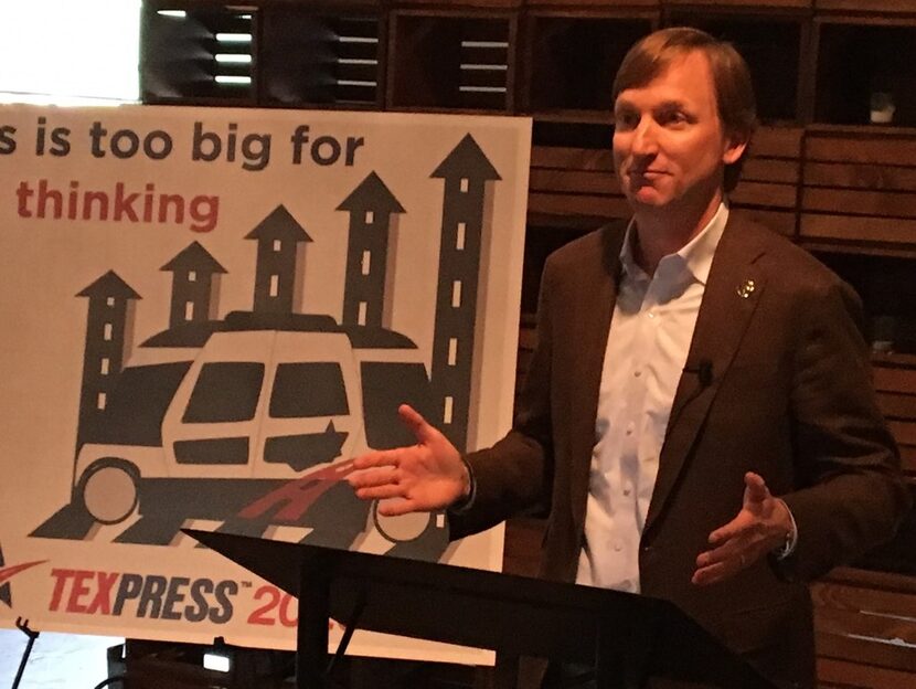 Democratic gubernatorial candidate Andrew White explains a job-creation plan at Impact Hub...