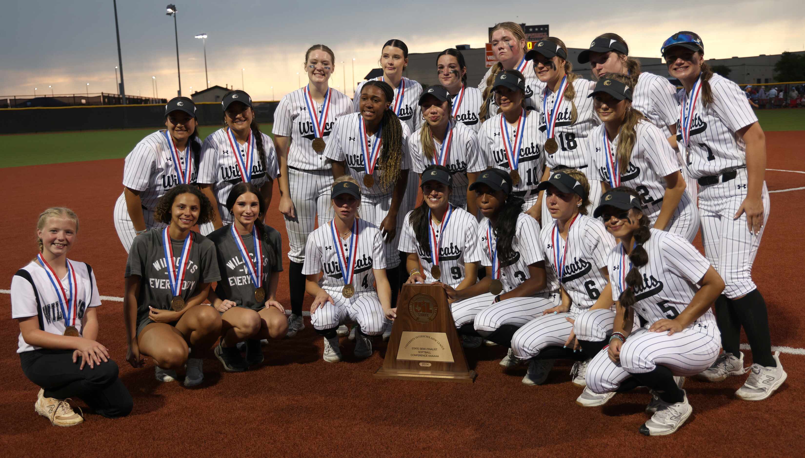 Denton Guyer players pose with their Class 6A state semi-finalist after their season-ending...