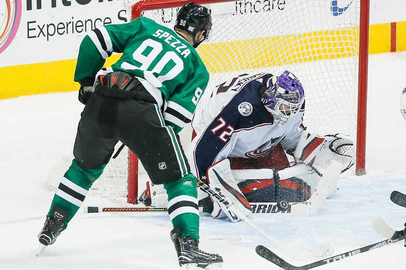 Dallas Stars forward Jason Spezza (90) looks for a rebound off of Columbus Blue Jackets...