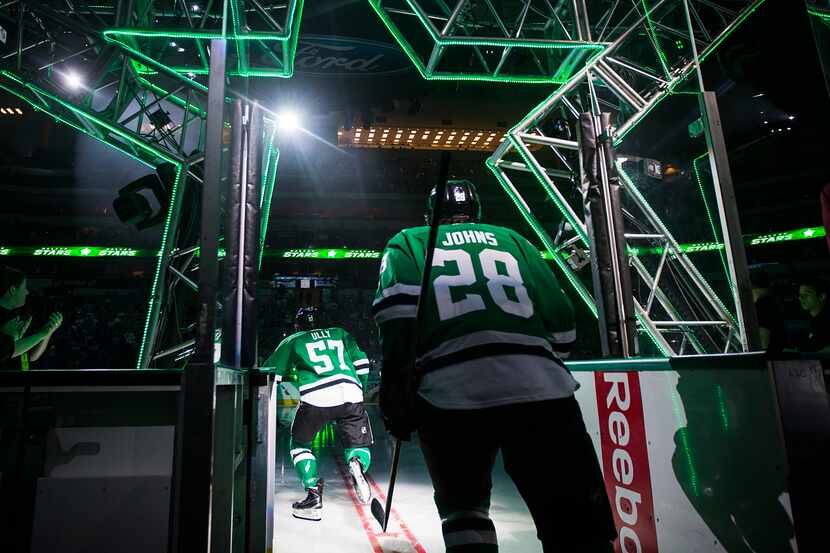 Dallas Stars left wing Cole Ully (57)  and defenseman Stephen Johns (28) take the ice for an...