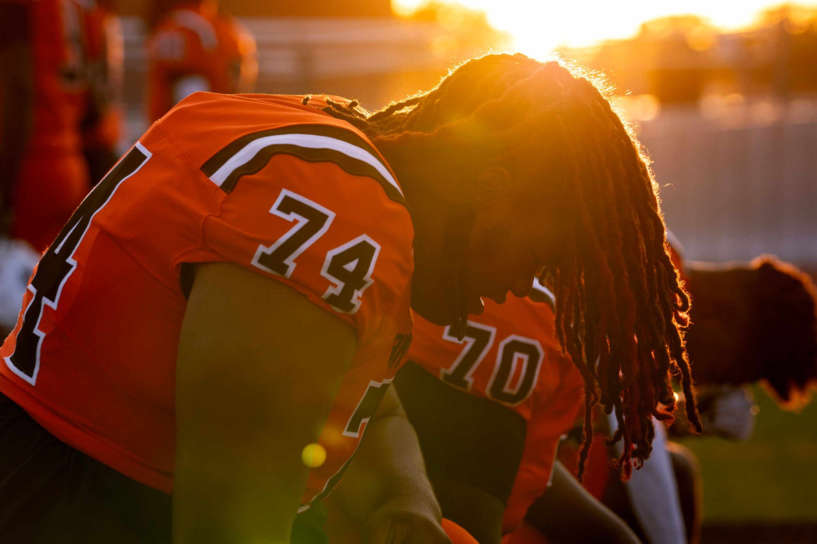 Lancaster senior offensive lineman Jeremiah Karim (74) prays before a high school football...