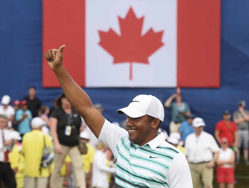Jhonattan Vegas, of Venezuela, celebrates after winning the Canadian Open golf tournament...