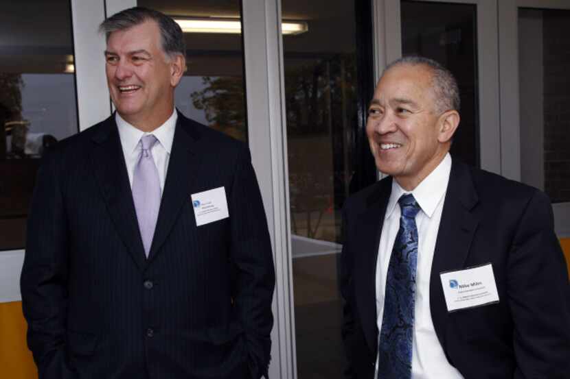 Dallas Mayor Mike Rawlings (left) stopped short of endorsing specific reform plans by Dallas...