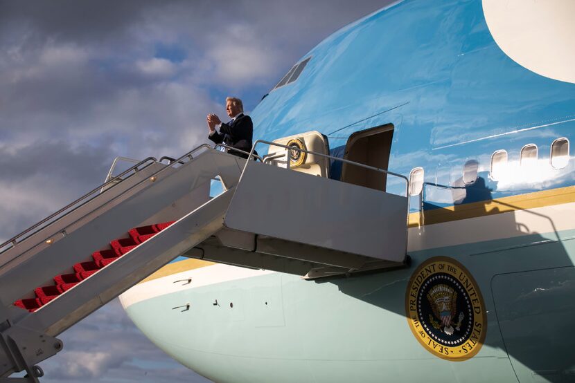 President Donald Trump arrives in West Palm Beach, Fla., aboard Air Force One, April 13,...