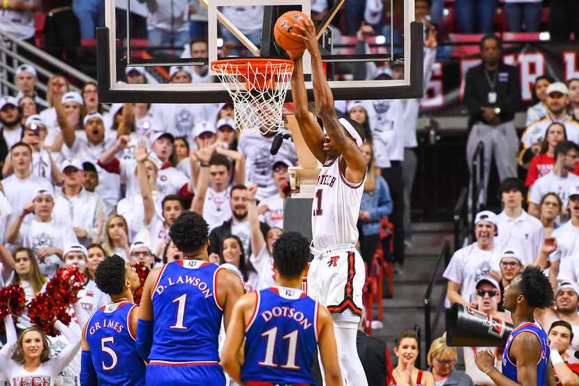 LUBBOCK, TX - FEBRUARY 23: Tariq Owens #11 of the Texas Tech Red Raiders dunks the...