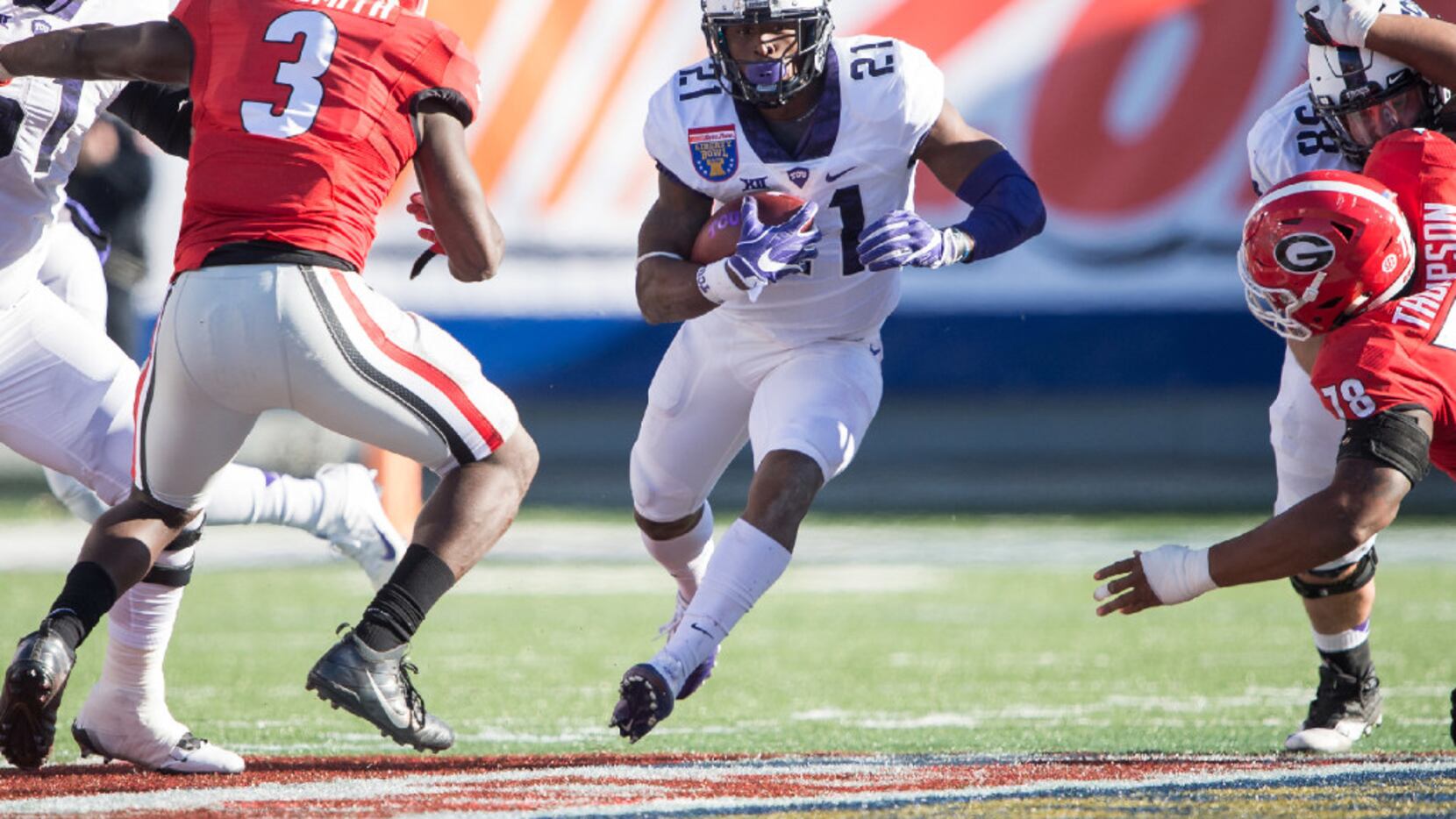 MEMPHIS, TN - DECEMBER 30: Running back Kyle Hicks #21 of the TCU Horned Frogs looks to...
