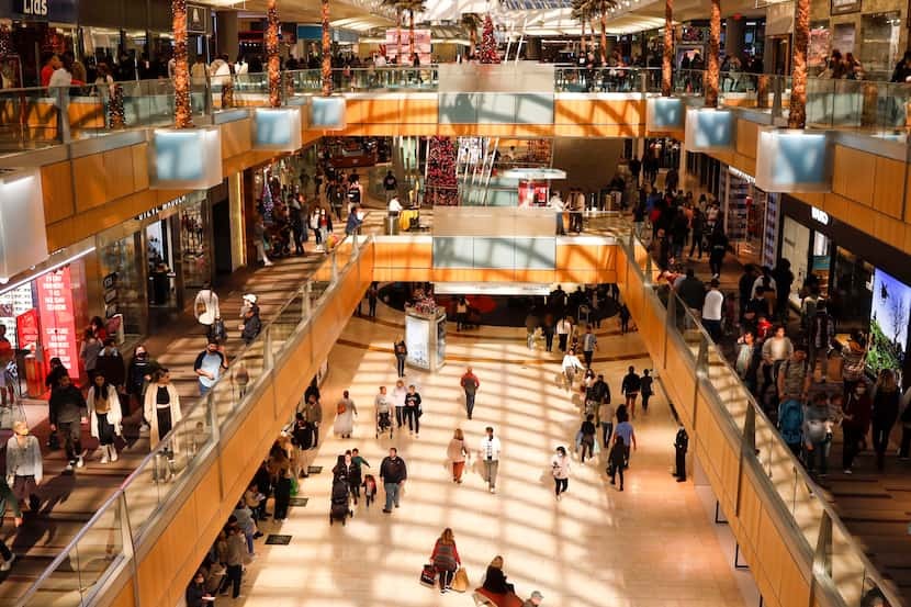 Crowds of people shop at Galleria Dallas on Black Friday.